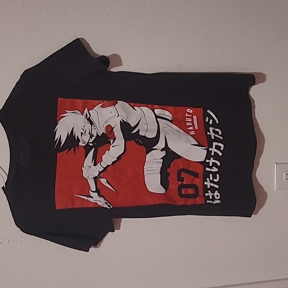 Size small black short sleeve shirt with anime graphic design on front